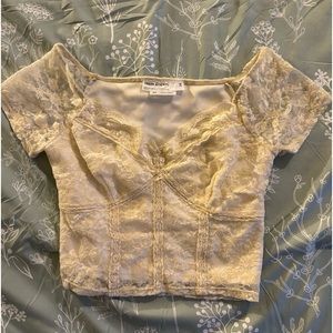 Cream colored lace short sleeved shirt. Brand Urban outfitters. Size S